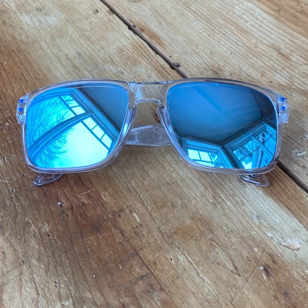 Oakley Clear Casual Sunglasses with Blue Lens